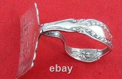 Sterling Silver Cuerved Handle Baby Food Pusher with horse's head, 1 7/8, NM